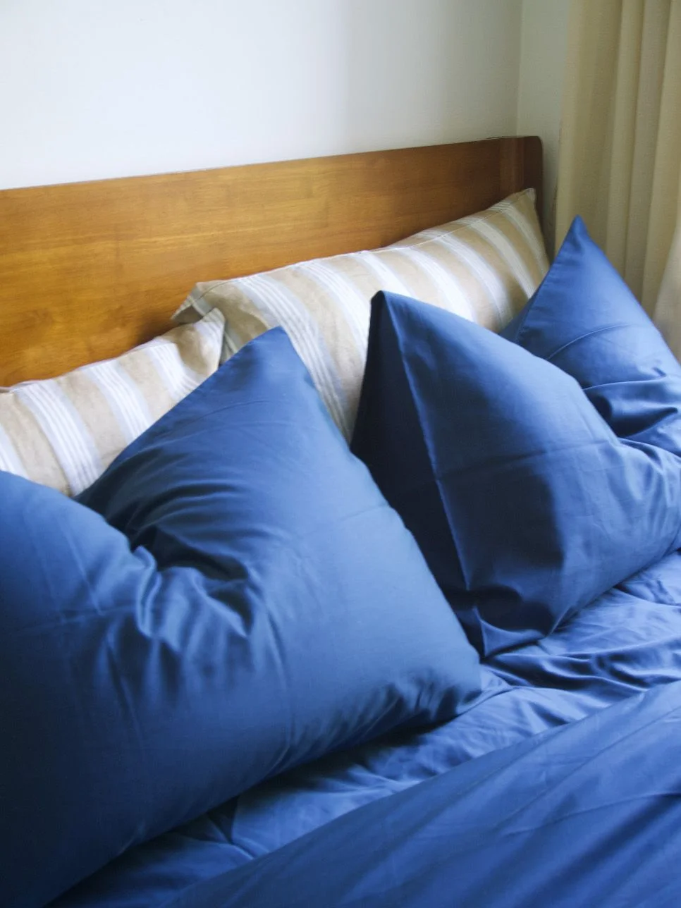 Image may contain Cushion Home Decor Pillow Bed and Furniture