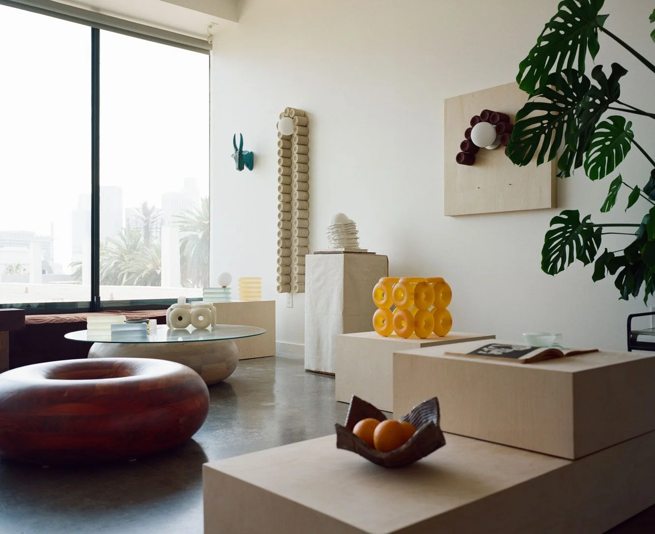 Image may contain Corner Furniture Table Home Decor Architecture Building Indoors Living Room Room and Dining Table