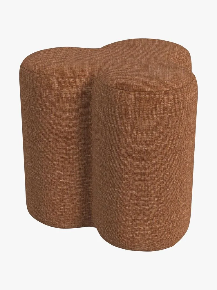 Clover Shaped Ottoman upholstered in a brown fabric.