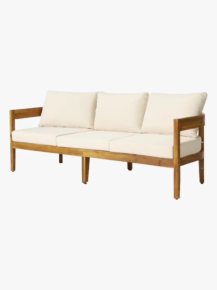 Image may contain: Couch, Furniture, Cushion, Home Decor, Bench, and Table
