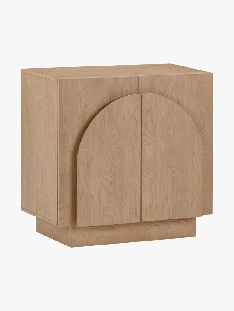Light wood credenza with arched handle detail.