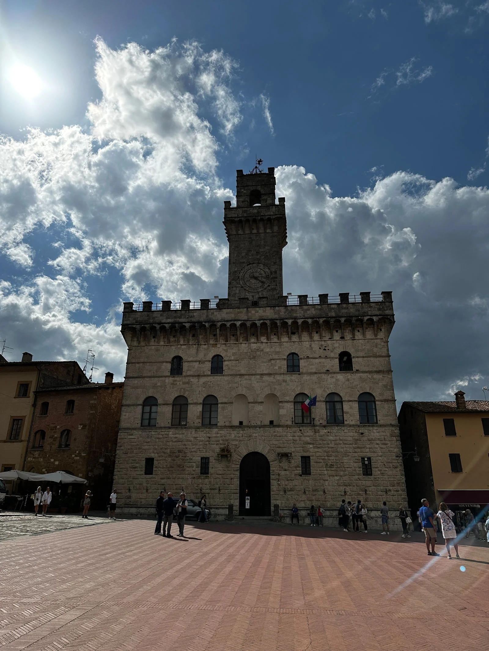 Image may contain Architecture Building Castle Fortress Bell Tower Tower Arch Gothic Arch Person and Car