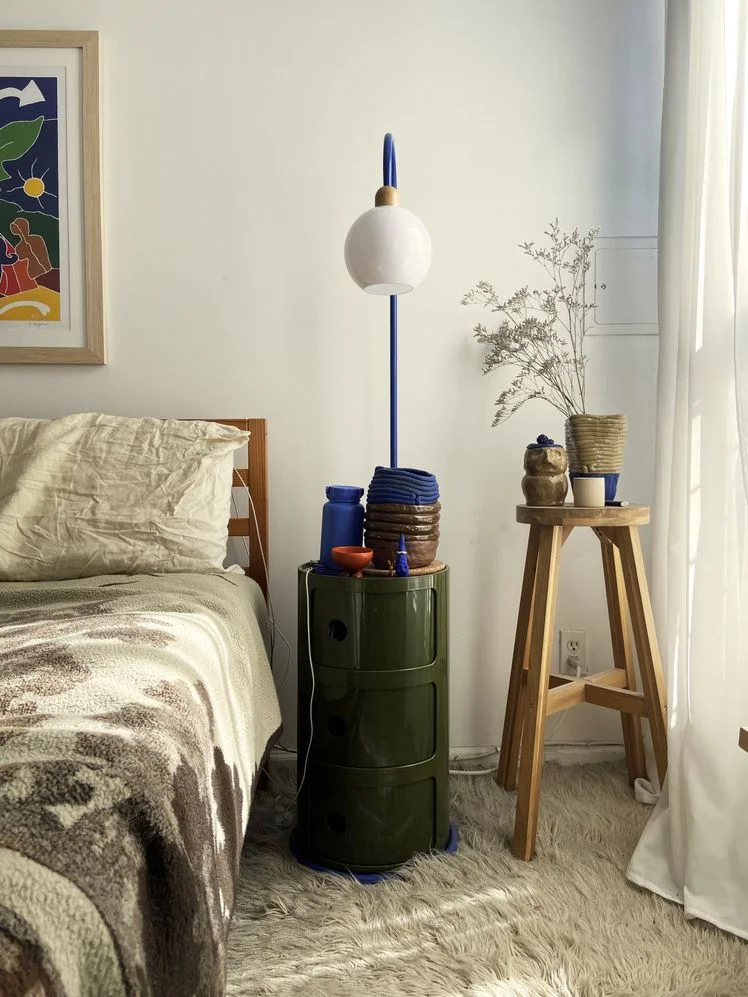 Kartell Componibili Round Modular Stacking Unit styled with lamp.