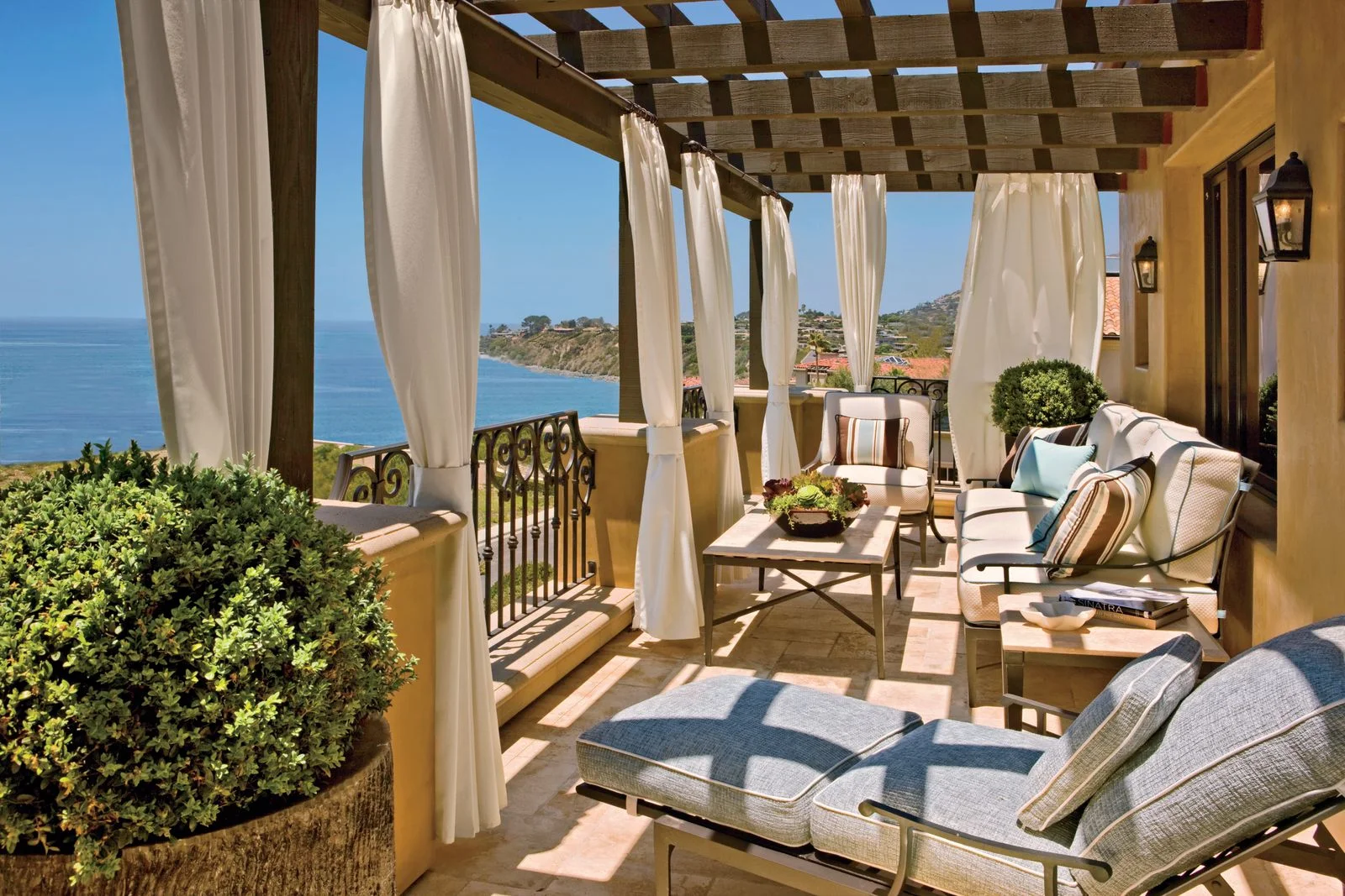 The primary patio overlooks coastal bluffs. “In LA the pace is so fast were always on the go” says the former basketball...