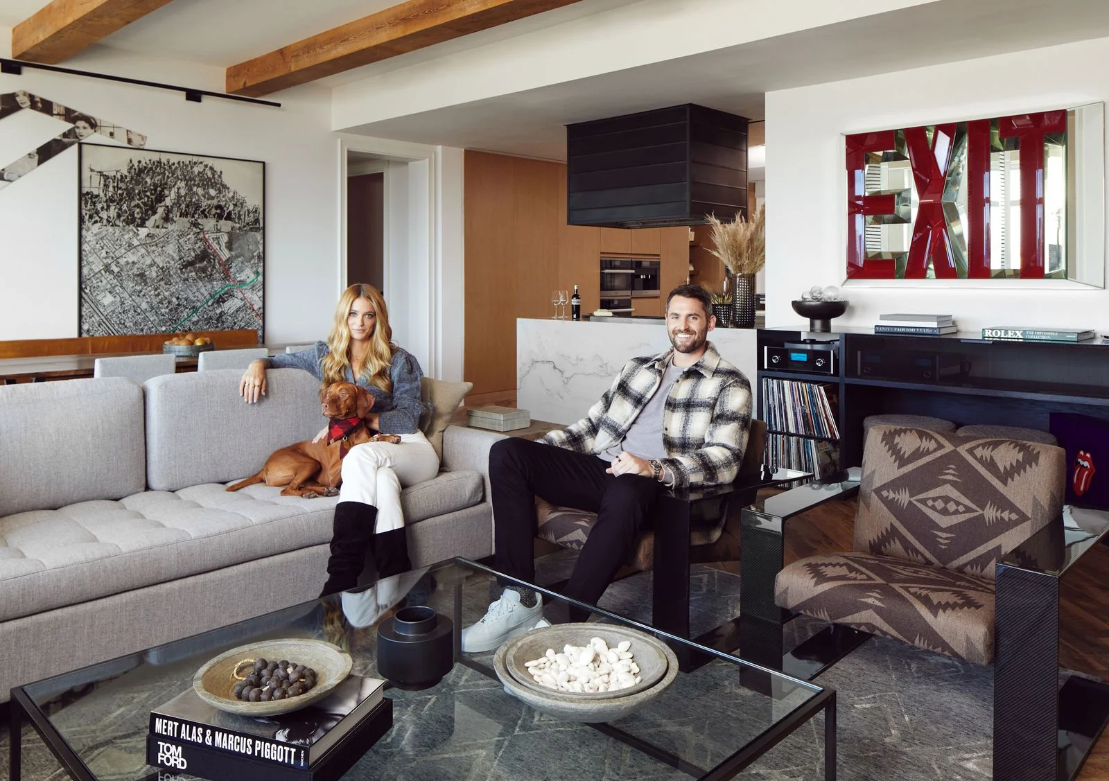 Image may contain Living Room Room Indoors Furniture Couch Human Person Table Kevin Love and Coffee Table