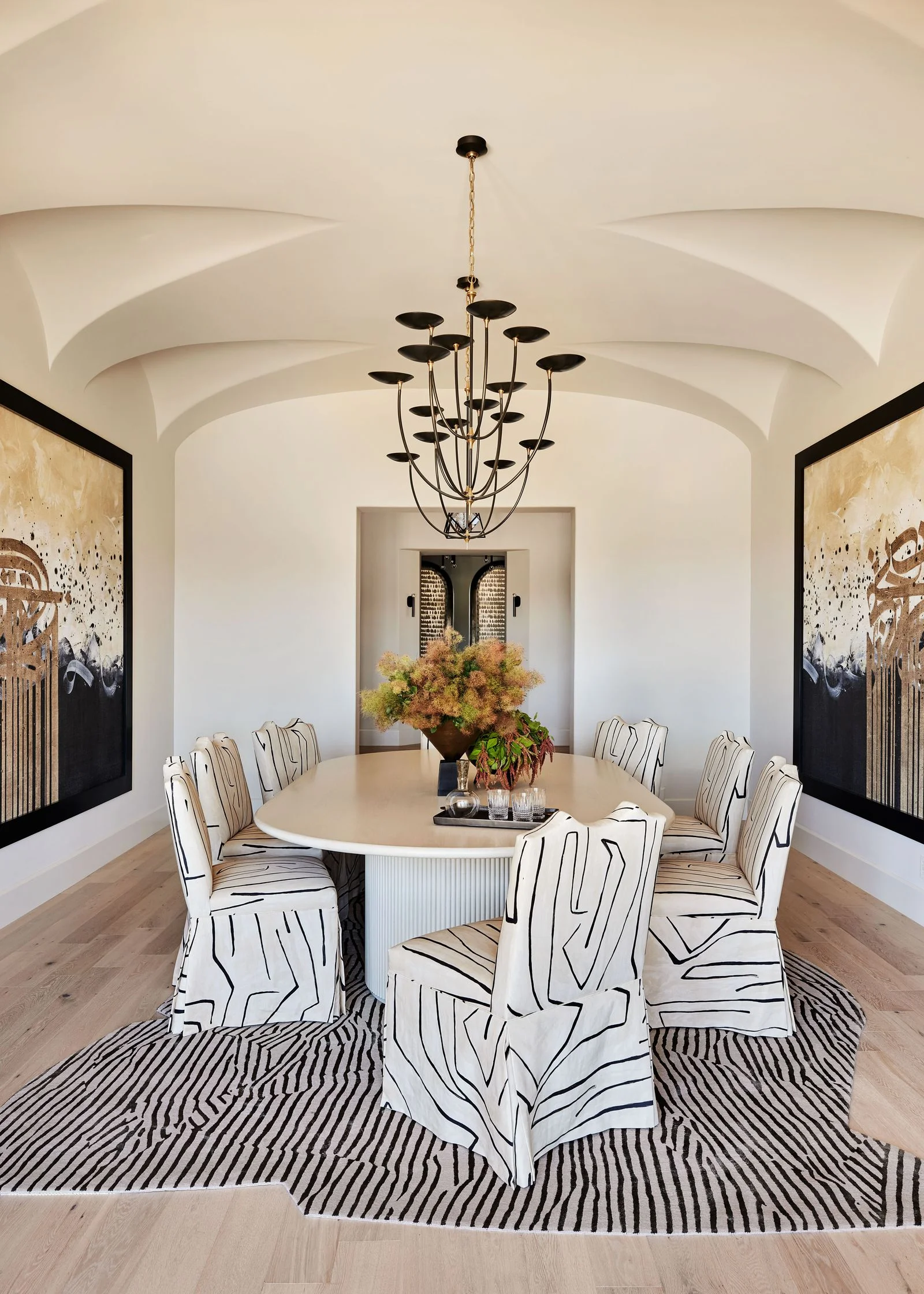 Image may contain Architecture Building Dining Room Dining Table Furniture Indoors Room Table Home Decor and Rug
