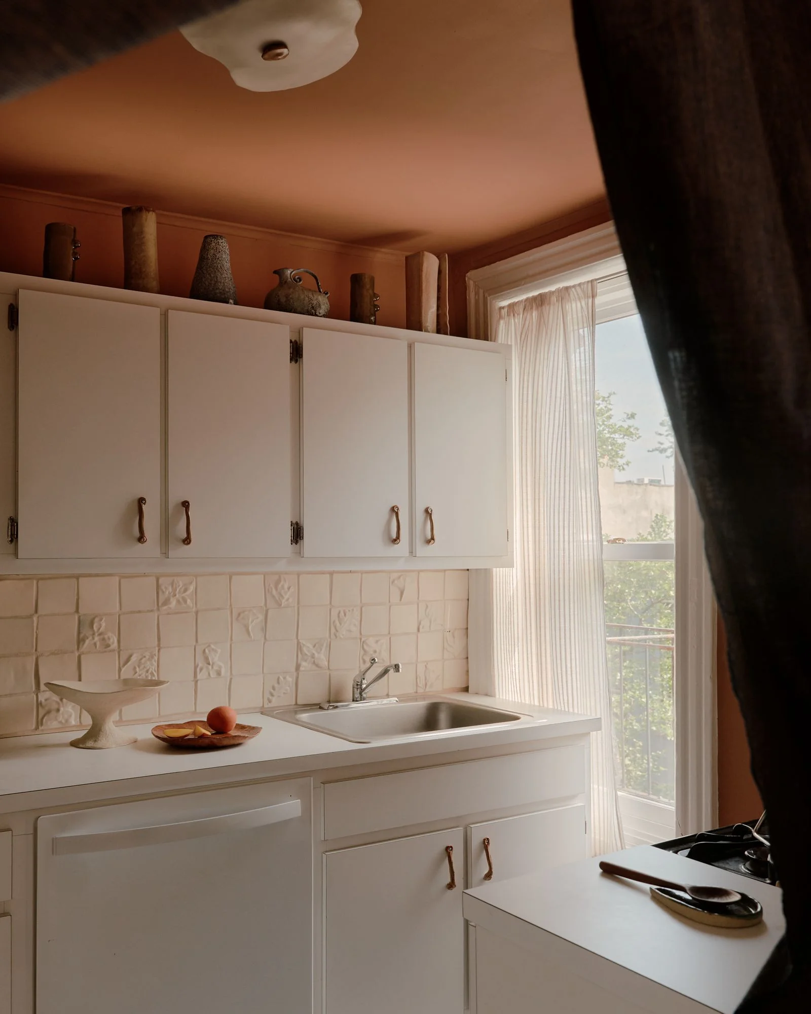 Image may contain Sink Sink Faucet Indoors Interior Design and Person