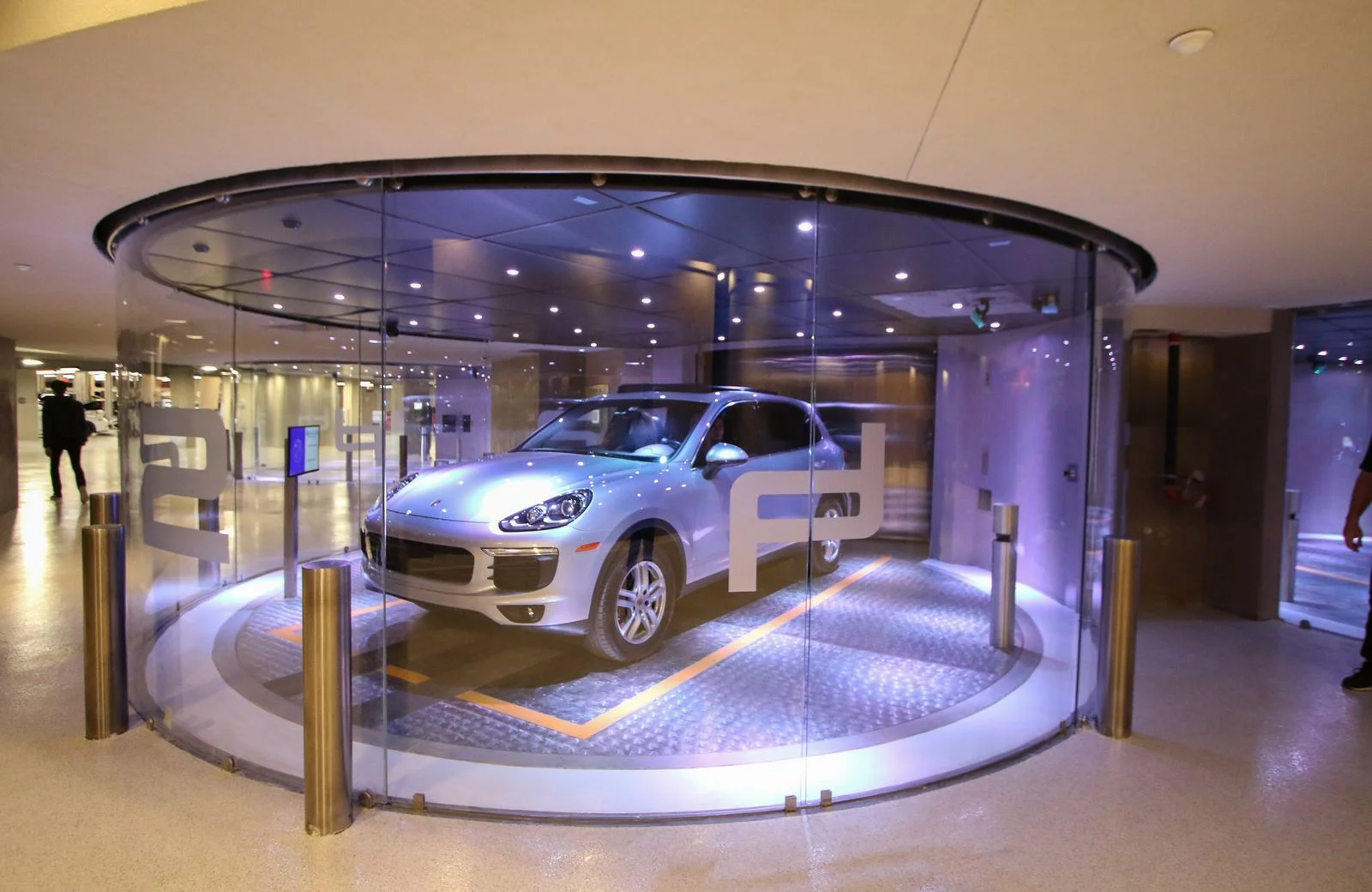 The car elevator inside the Porsche Design Tower