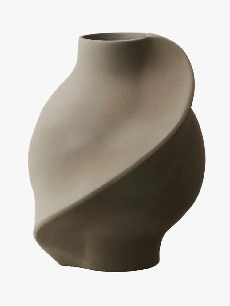 Gray vase with spiral detail.