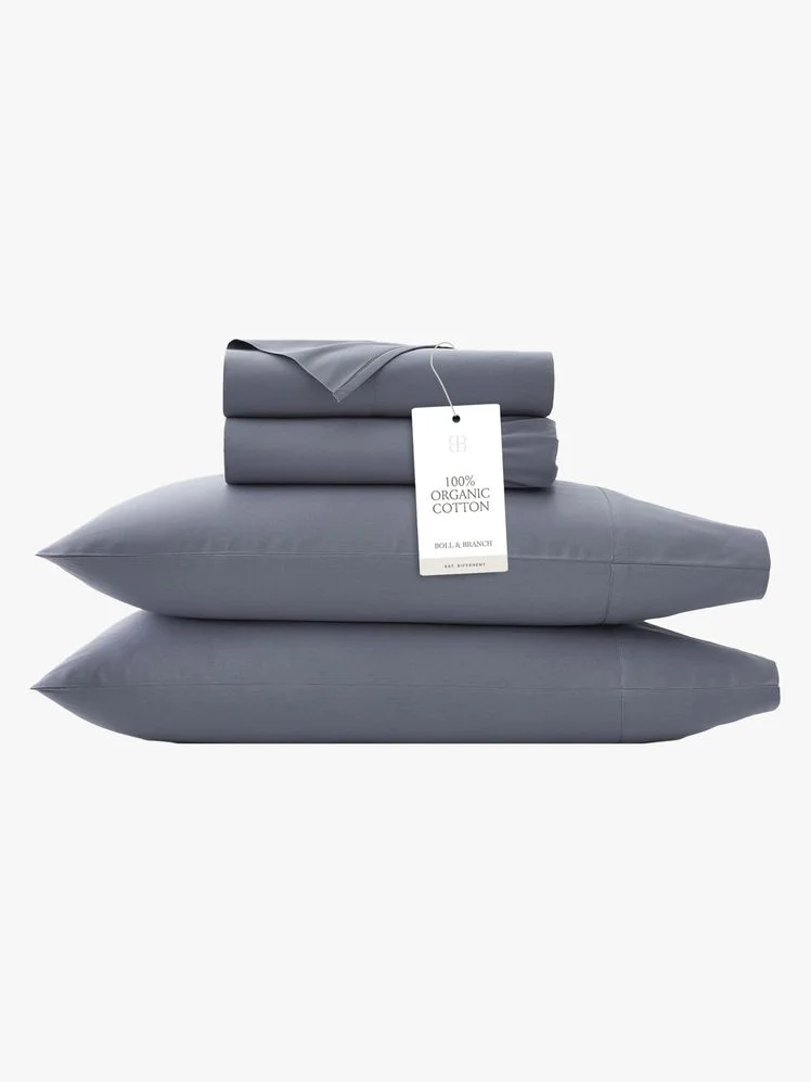 Image may contain: Cushion, Home Decor, Pillow, Blanket, and Linen