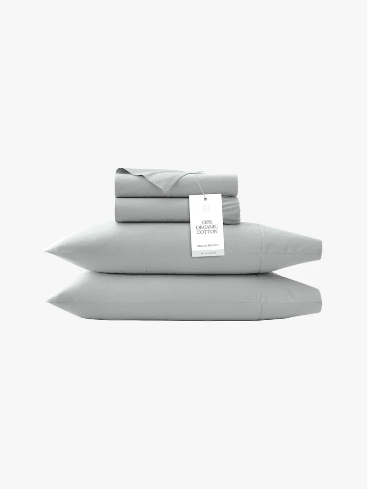 Image may contain: Cushion, Home Decor, Linen, Pillow, and Blanket