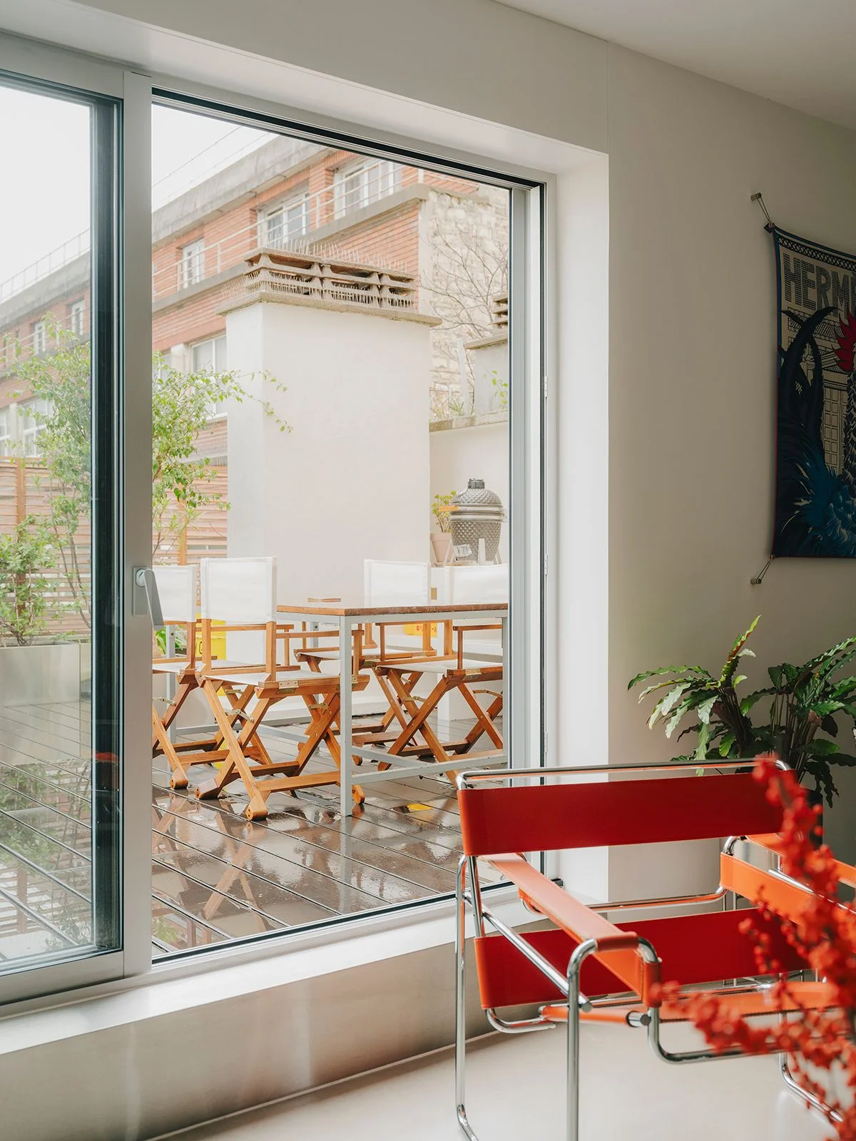 Image may contain Architecture Balcony Building Window Chair and Furniture