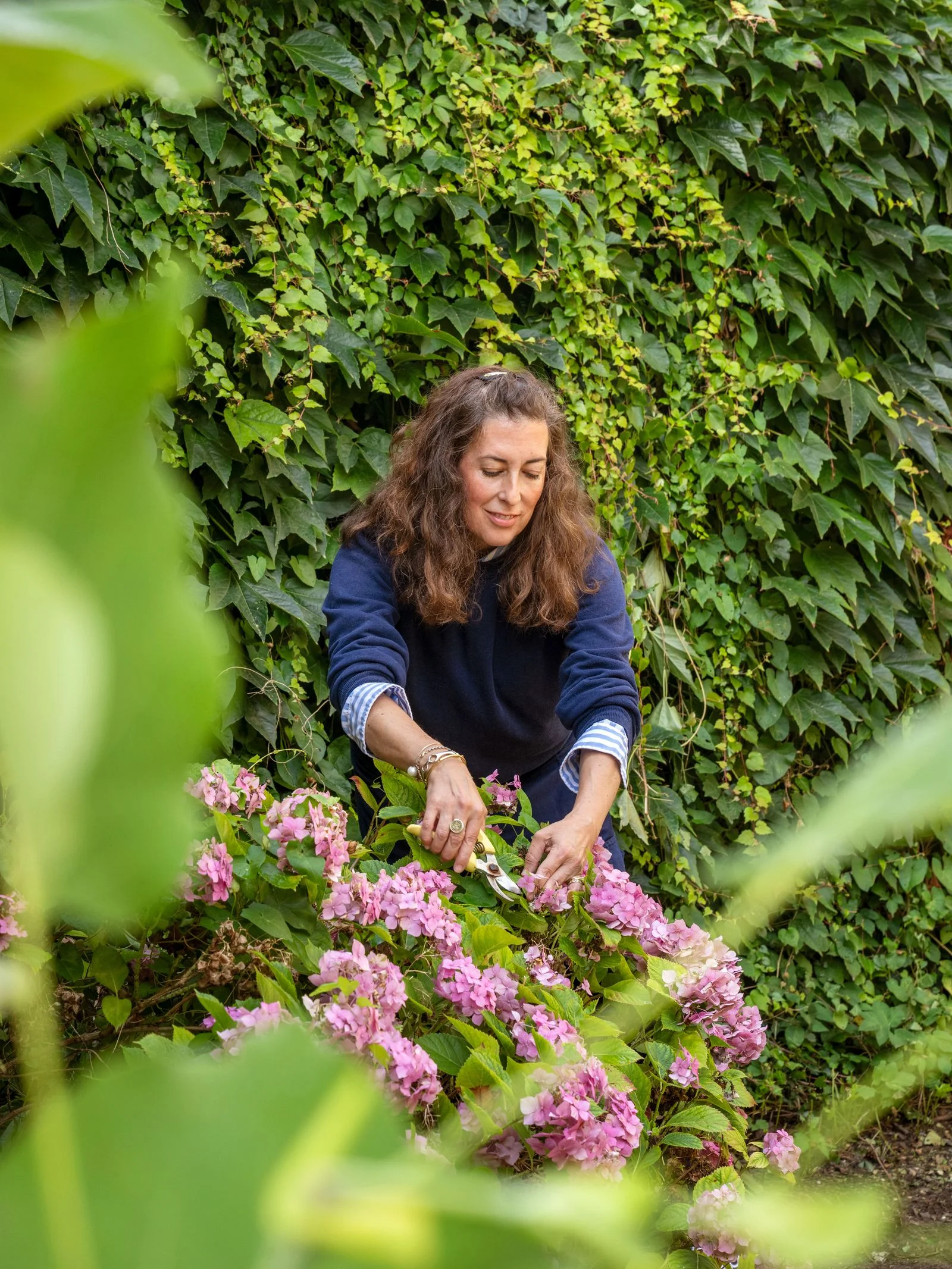 Image may contain Ruddy Rodríguez Garden Nature Outdoors Gardening Adult Person Gardener and Sitting